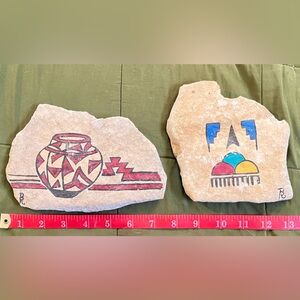 2 decorative Native American paintings on rock signed by artist